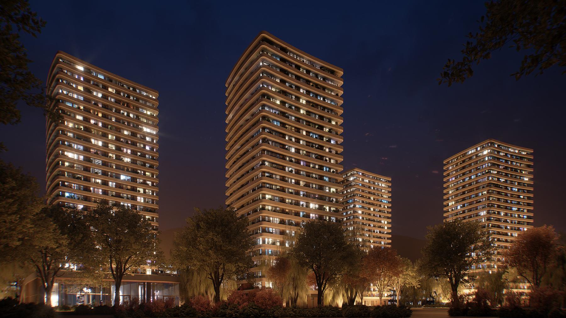 Četiri tornja Allegheny Park Residencea noću, s osvijetljenim terasama iznad krošanja parka